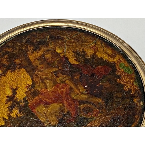 170 - Antique tortoiseshell circular lidded box, the top lacquered with a romantic scene, 9.5cm diameter