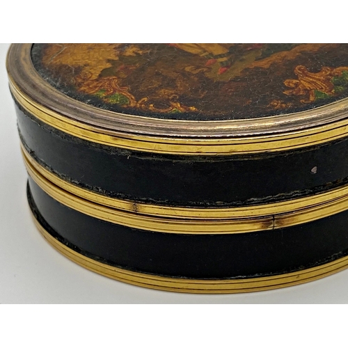 170 - Antique tortoiseshell circular lidded box, the top lacquered with a romantic scene, 9.5cm diameter