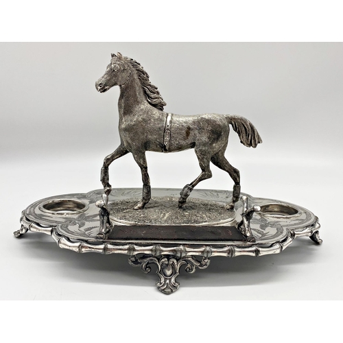 181 - Good quality 19th century silverplated desk standish, mounted by a cast horse, flanked by two inset ... 