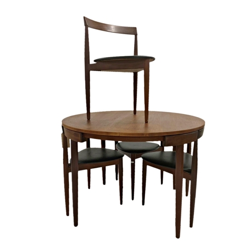 122 - Hans Olsen for Frem Rojle - 'Roundette' Danish teak dining table and four chairs, the chairs on thre... 