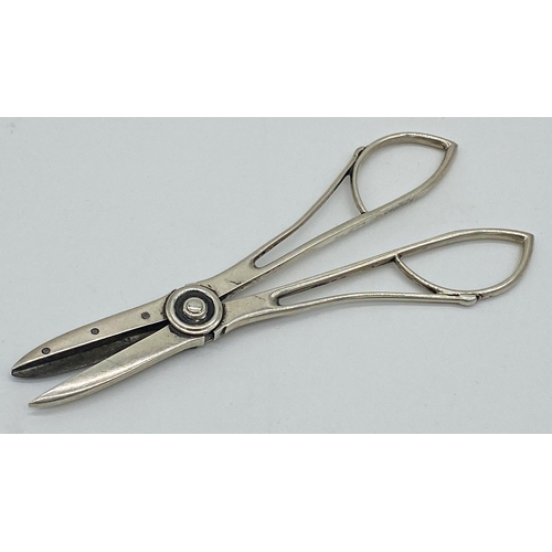 33 - Pair of Secessionist style grape scissors marked sterling