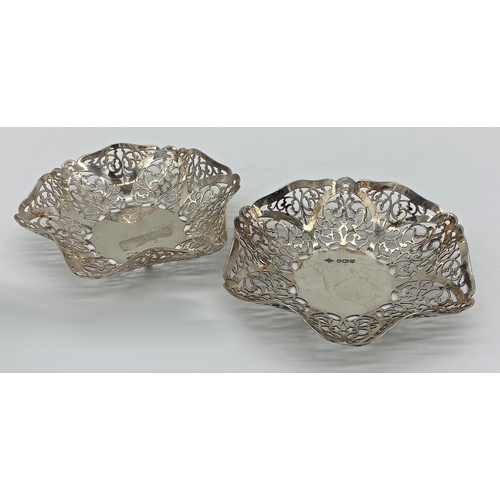 56 - Matched pair of pierce silver bonbon dishes, one is maker Douglas Heeley, Sheffield 1959, 13cm wide,... 