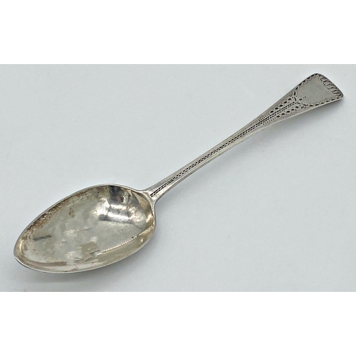 59 - George III bright cut silver table spoon, maker marks worn, London 1793, 22cm long