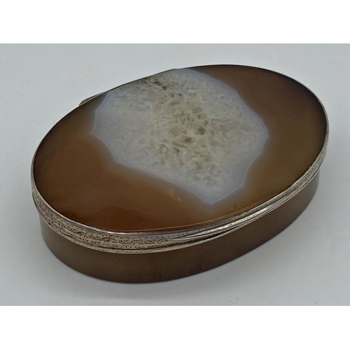 61 - Agate oval box, with silver band and hinged lid, 9cm long