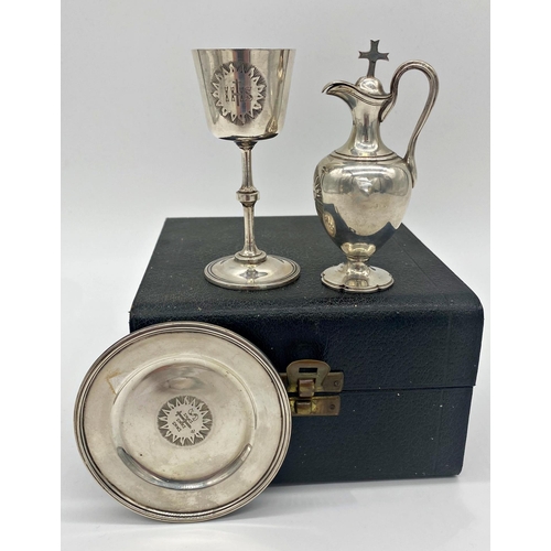 62 - Victorian silver travelling communion set, with ewer, chalice and paten, in box (the jug not origina... 