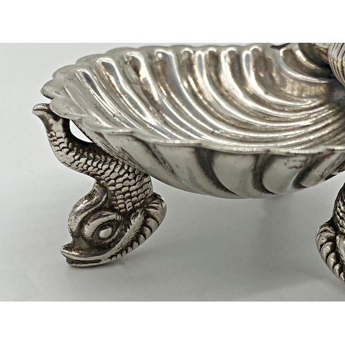 67 - Pair of good quality Victorian cast silver scallop shell salts, with dolphin feet, maker William Hut... 