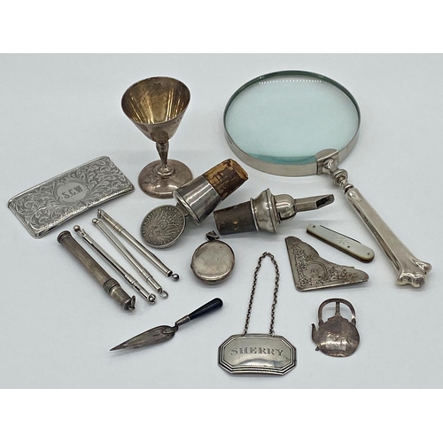 81 - Mixed good bijouterie silver to include silver handled magnifying glass, bottle spout, 835 German si... 