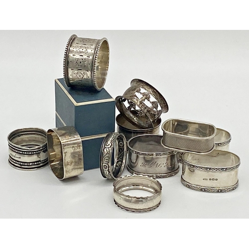 82 - Eleven silver napkin rings, 6oz approx