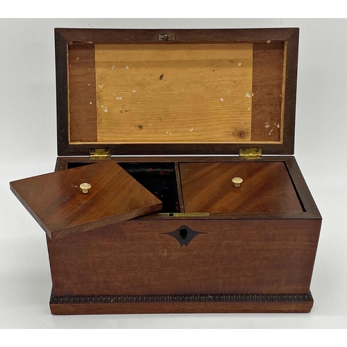 337 - Regency mahogany sarcophagus tea caddy with fluted rims, the hinged lid enclosing a twin lidded inte... 