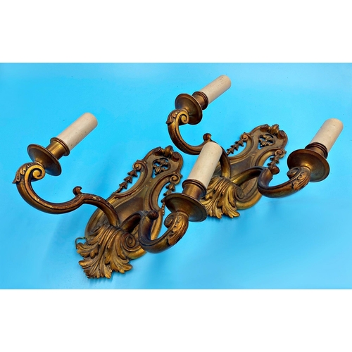 1071 - Pair of good quality cast gilt twin branch wall lights, 30 high x 27 cm wide (2)