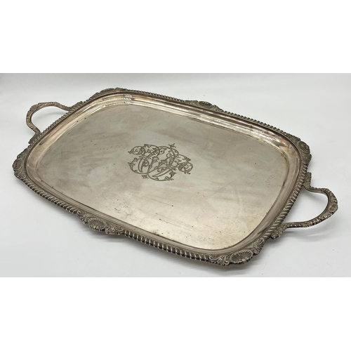 8 - Very large silver plated twin handled tray, with cast scallop shell boarders, by Walker & Hall, 76cm... 