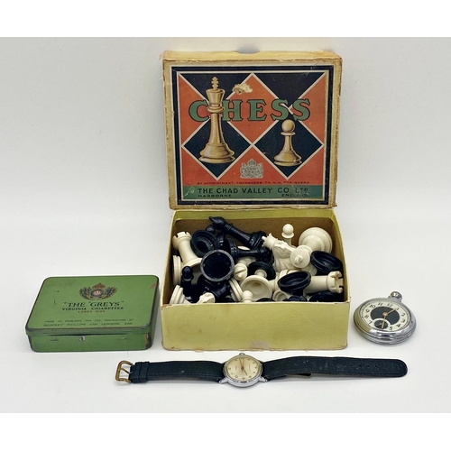 412 - Mixed cabinet lot to include a vintage chrome Ingersoll pocket watch, Timex wristwatch, a Chad Valle... 