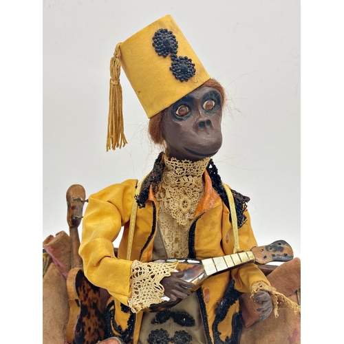 304 - Possibly by Phalibois - incredible 19th century continental automaton in the form of a monkey playin... 