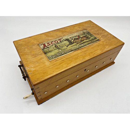 423 - 'Ascot, the new racing game', by Jaques and Son of London, the oak case fitted with eight lead horse... 