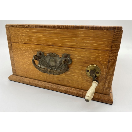 423 - 'Ascot, the new racing game', by Jaques and Son of London, the oak case fitted with eight lead horse... 