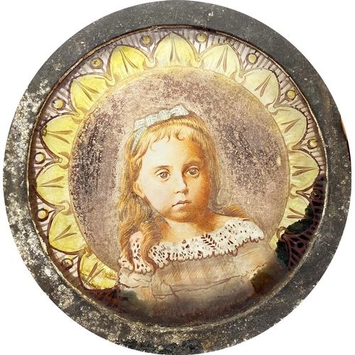 532 - Pair of 19th century painted glass panels of a young boy and girl, within iron mounts, 15.5cm diamet... 