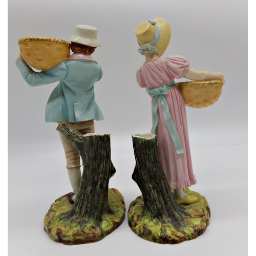 535 - Pair of Royal Worcester porcelain figural spill vases, a boy fruit picker and his partner, 24cm high... 