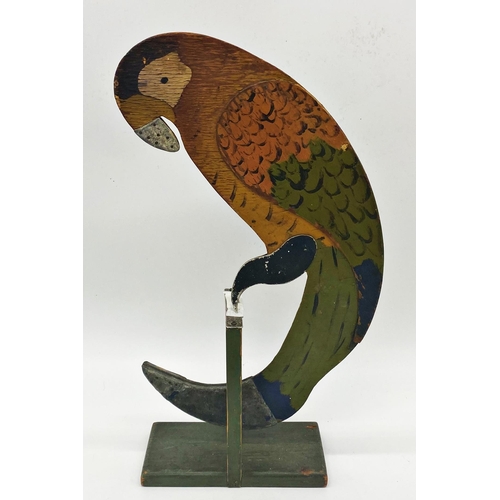 357 - Collection of wooden cut-out playful vintage characters to include a pot stand mounted by a dachshun... 