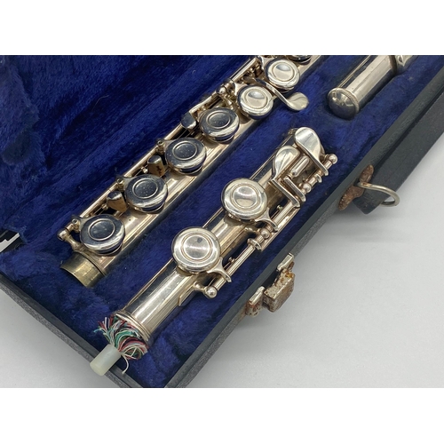 358 - American cased silver plated flute by Blessing