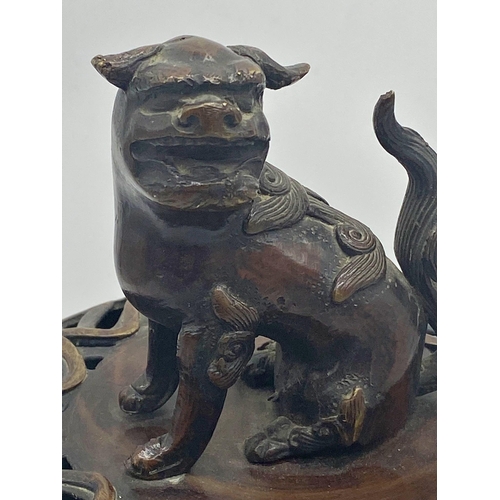 495 - Good Japanese bronze and cloisonne twin handled koro, the lid mounted by a seated Dog of Fo, 38cm hi... 