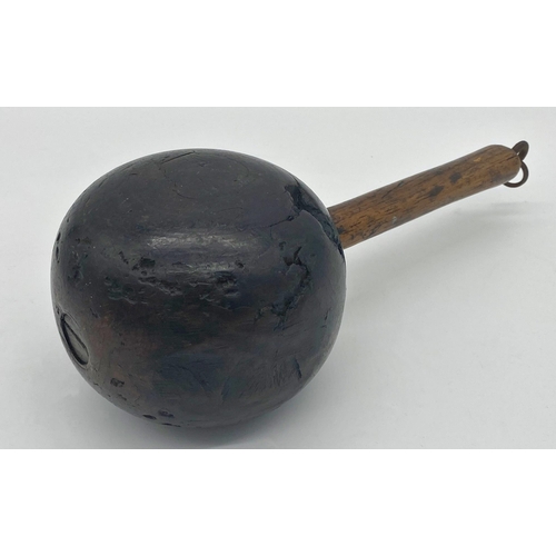 369 - An antique provincial cudgel, 29cm long