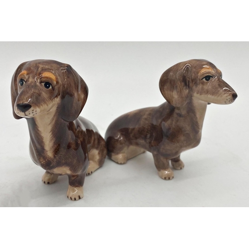 381 - A mixed dog lot to include a cast iron stamp in the form of a seated terrier, a brush with a terrier... 