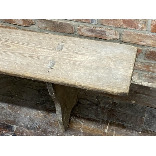 1150 - A provincial French pine bench, 199cm long x 44cm high