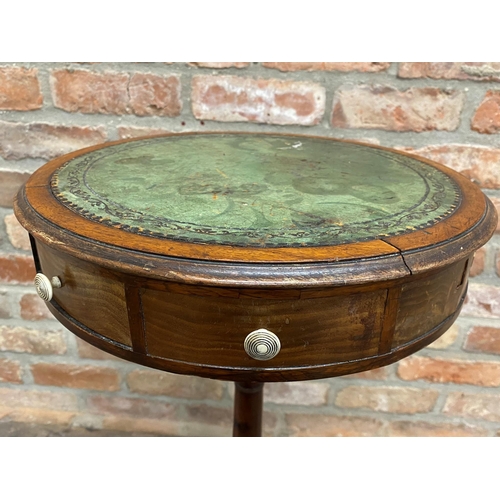 1162 - Georgian mahogany drum top wine table, the gilt tooled leather top above an arrangement of drawers, ... 