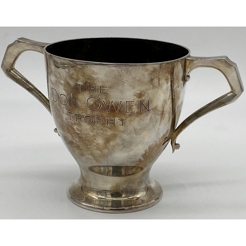 114 - Edwardian silver twin handled trophy inscribed 'The Don Owen Trophy', maker Gibson and co, London 19... 