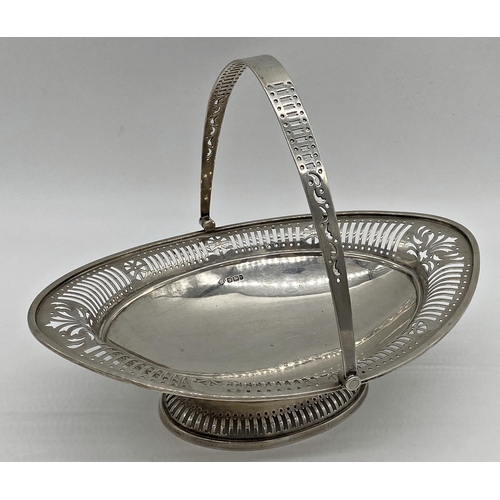 119 - Edwardian silver basket, hinged handle and pierced rim, maker Martin Hall & co, Sheffield 1900, 28.5... 