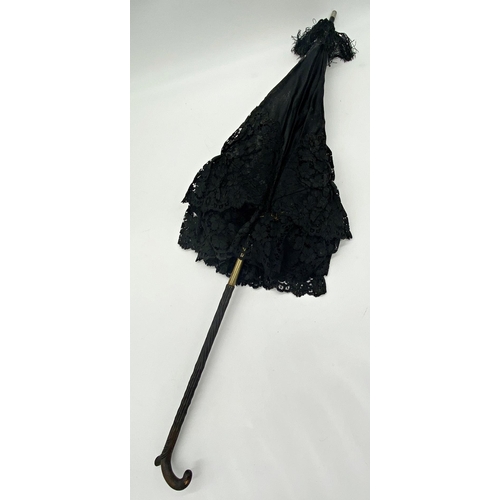 444 - Good turn of the century parasol with carved wooden handle and gilt column, 92cm long