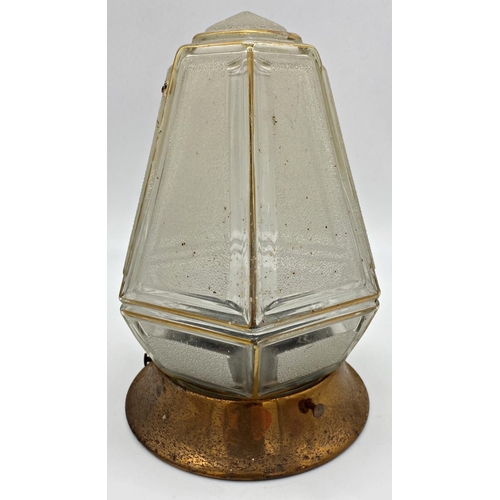 1062 - Art Deco gilt and frosted glass sky scraper shade upon a copper mount, 23cm high, with a similar fac... 