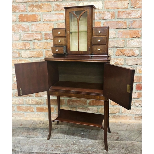 1209 - Good early 20th century exhibition quality cabinet, raised glazed back flanked by six small drawers,... 