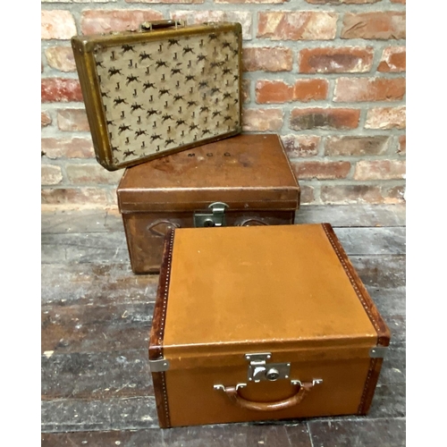 424 - Two leather hard cases, probably dressing cases, one with studded exterior together with a further l... 