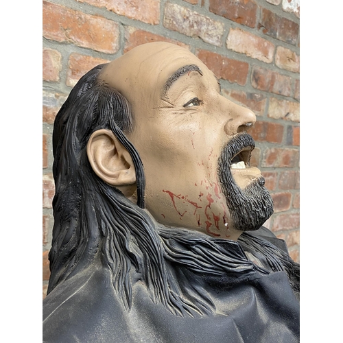 1136 - Life sized articulated mannequin of a bearded gentleman in a black suit covered in blood, begging fo... 