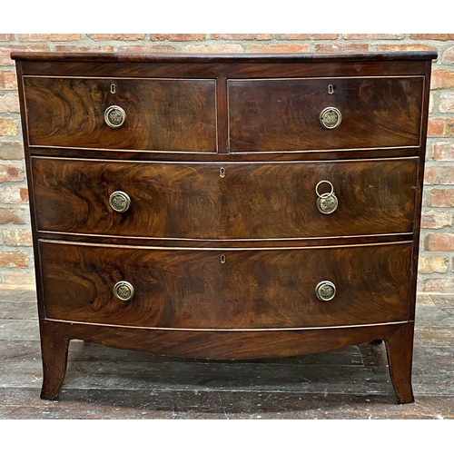 1187 - Georgian mahogany bow fronted chest of drawers, two short over two long with the escutcheon embossed... 