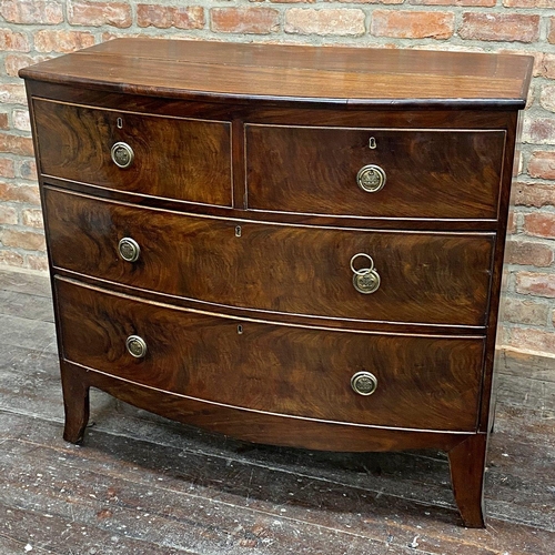 1187 - Georgian mahogany bow fronted chest of drawers, two short over two long with the escutcheon embossed... 