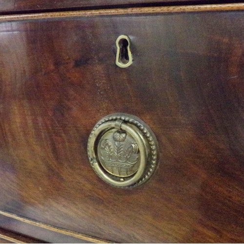 1187 - Georgian mahogany bow fronted chest of drawers, two short over two long with the escutcheon embossed... 