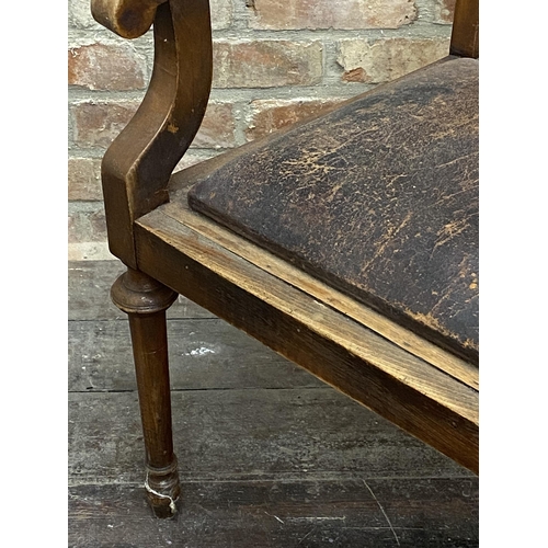 1188 - Unusual Edwardian beech framed barber's chair with adjustable head rest and drop in leather seat