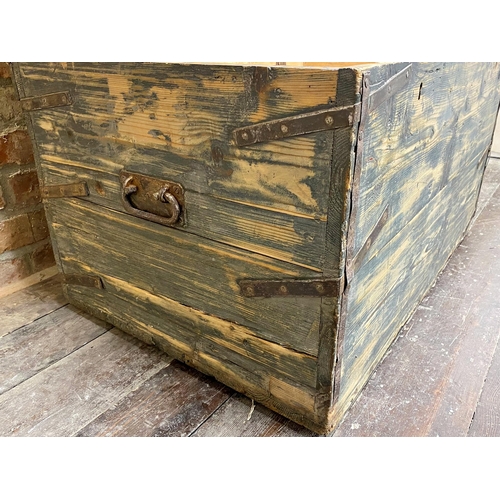 1192 - Vintage scrubbed pine military trunk with twin iron handles and strap work, inscribed MAGJ.F.Warren,... 