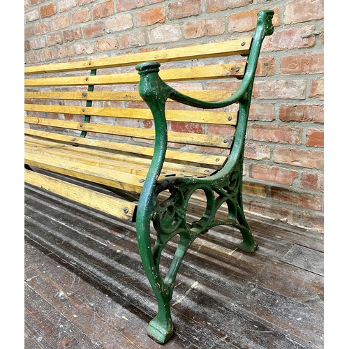 1005 - A good quality cast iron sprung bench with newly fitted teak slats, 182cm long