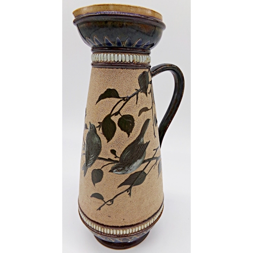 537 - Doulton Lambeth - Jug decorated with bird, 26cm high and small vase, further Lambeth style circular ... 