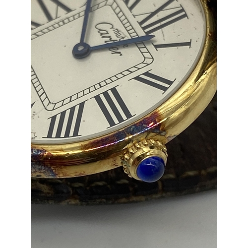 244 - Cartier Vermeil (gold on silver) Dress Watch 094986, 30mm case, jewelled crown, with silver dial wit... 