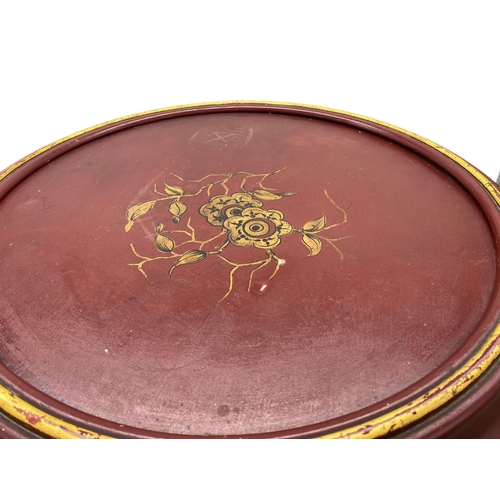 1225 - Quality French red lacquered chinoiserie wine table, with gilt overlay, 44cm high x 47cm diameter