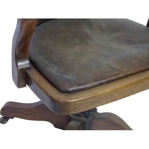 1233 - Good quality Edwardian oak revolving desk chair, with leather upholstery, 90cm high