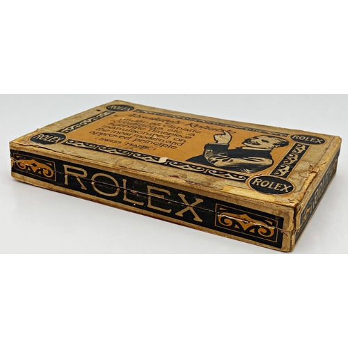 291 - Rare early Rolex pocket watch or parts box, the lid printed with a moustached man pointing to text '... 