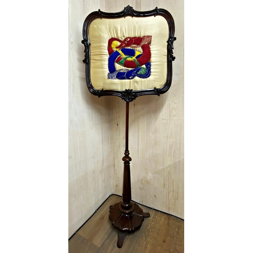 1216 - William IV rosewood polescreen, stitched with Arts and Crafts type fish. 160cm high