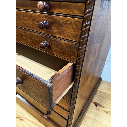 1217 - Early 20th century bank of specimen drawers, fitted with eight drawers and turned pilasters, 60cm hi... 