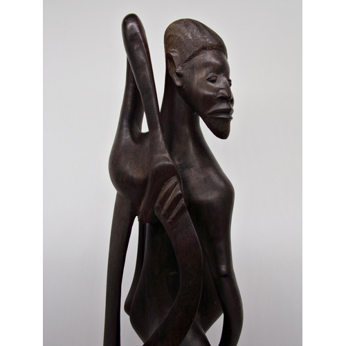 512 - Tribal interest - Large African hardwood figure, indistinct inscription to base