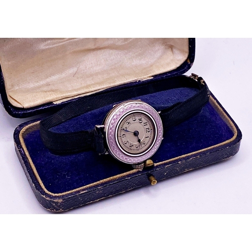 275 - Art Deco silver dress watch, 27mm case, guilloche enamel bezel, silvered dial with Arabic numerals, ... 